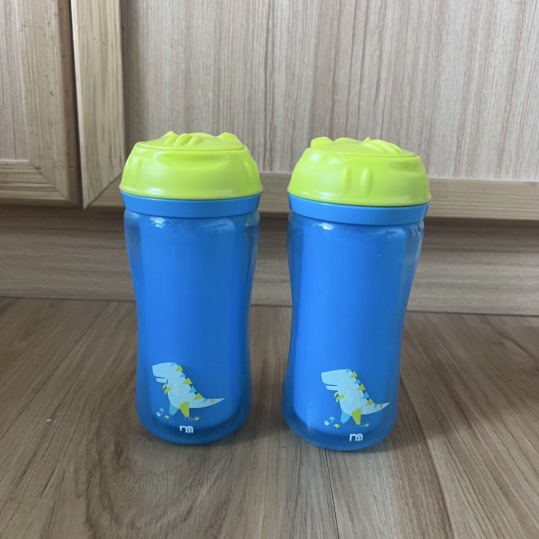 Mothercare Straw Sippy Cups 2 pcs TAKE ALL (Category: Weaning & Toddler Feeding) located in Cebu City. Submitted by stylesourceph (Listing ID 1460176690, Image 1). Description: - Set of 2 blue sippy cups - Fun dinosaur design - Bright green lids with built-in straws - Easy-to-hold shape for little hands - Ideal for toddlers learning to drink independently - Sold as a pair.