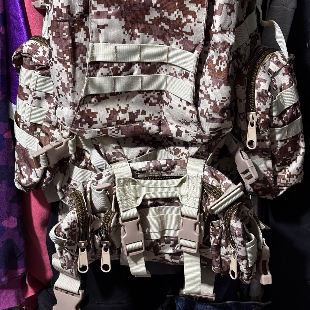 Multi-Pocket Camouflage Backpack (Category: Backpacks) located in Caloocan City. Submitted by bonsatocha43876 (Listing ID 1460193503, Image 3). Description: - Multi-pocket camouflage backpack - Dimensions: 14" width, 24" length - Price: 1100 pesos only.
