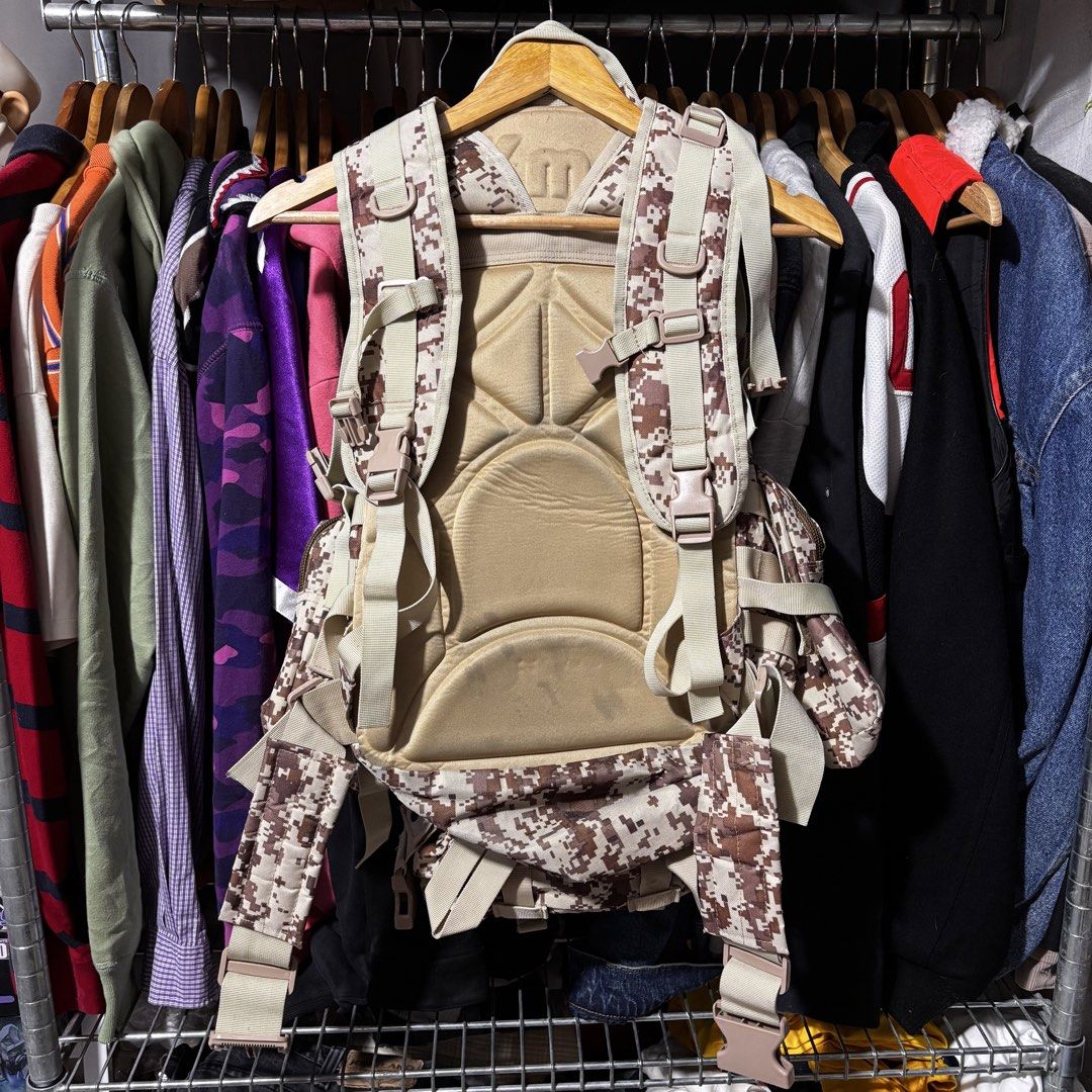 Multi-Pocket Camouflage Backpack (Category: Backpacks) located in Caloocan City. Submitted by bonsatocha43876 (Listing ID 1460193503, Image 2). Description: - Multi-pocket camouflage backpack - Dimensions: 14" width, 24" length - Price: 1100 pesos only.