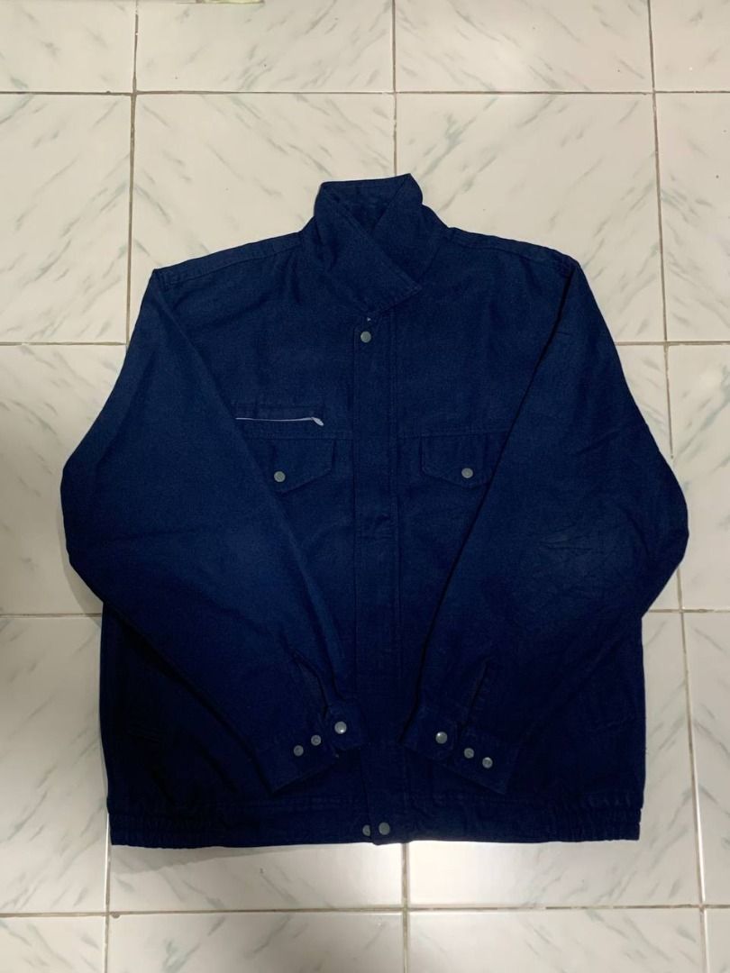 Navy Blue Workwear Jacket (Category: Coats, Jackets and Outerwear) located in Marikina City. Submitted by cosmicfish_aad03c (Listing ID 1460147107, Image 1). Description: Classic navy blue workwear jacket. Features chest pockets, zippered pocket, button cuffs, and elasticated hem. Durable for everyday wear. L - 26 W - 20.