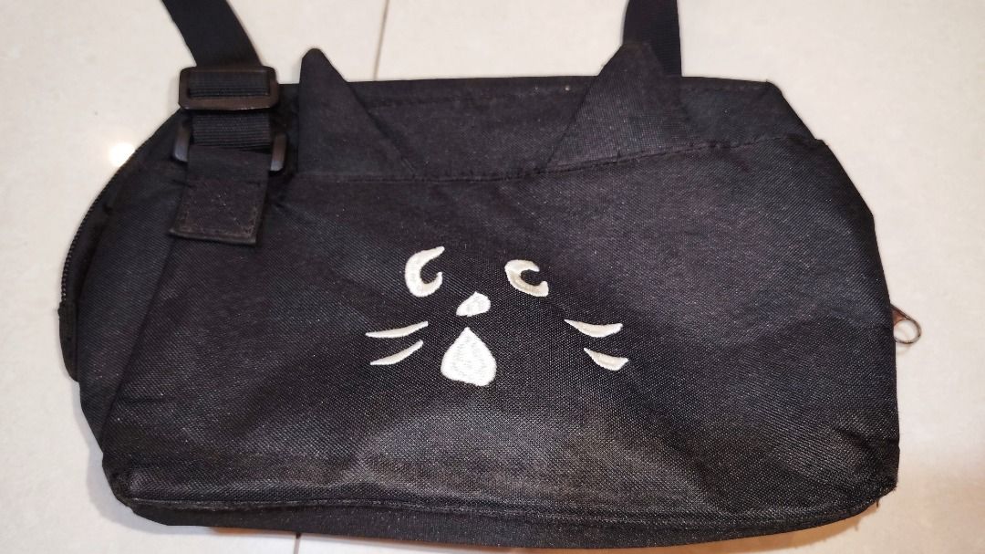 Ne-net "Nya" cat Pouch/Shoulder Bag (Category: Shoulder Bags) located in Bacolor. Submitted by thriftyperminute (Listing ID 1460282977, Image 2). Description: -This is a pre-loved or thrifted item so please manage your expectations. -Color may slightly differ due to lighting or with the settings of the device used to view the photos -"Mine" now, pay now policy -Payment through gcash -Sure buyers only, please -No cancellation of orders -No return,