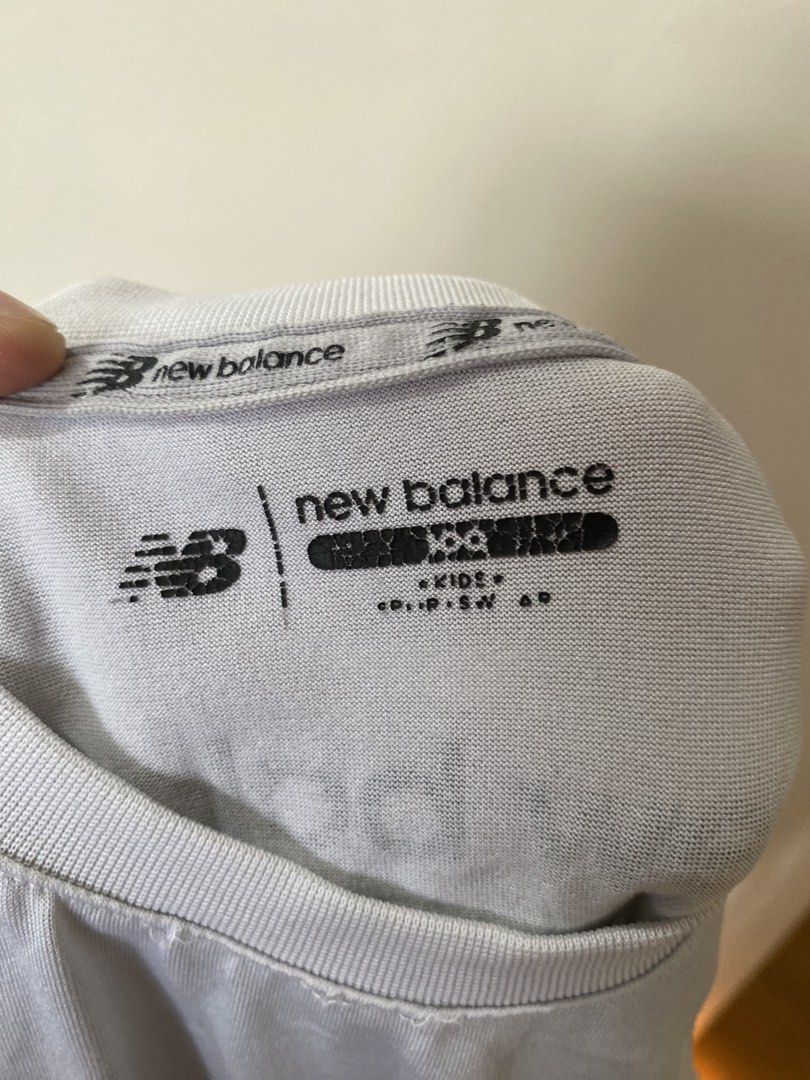 New Balance Shirt 3-4T (Category: Babies & Kids Fashion) located in Mabalacat. Submitted by mamacda (Listing ID 1460144494, Image 2). Description: like new sana kaso nagkaron rin ng crack print dahil sa pag laba, sa dryer.