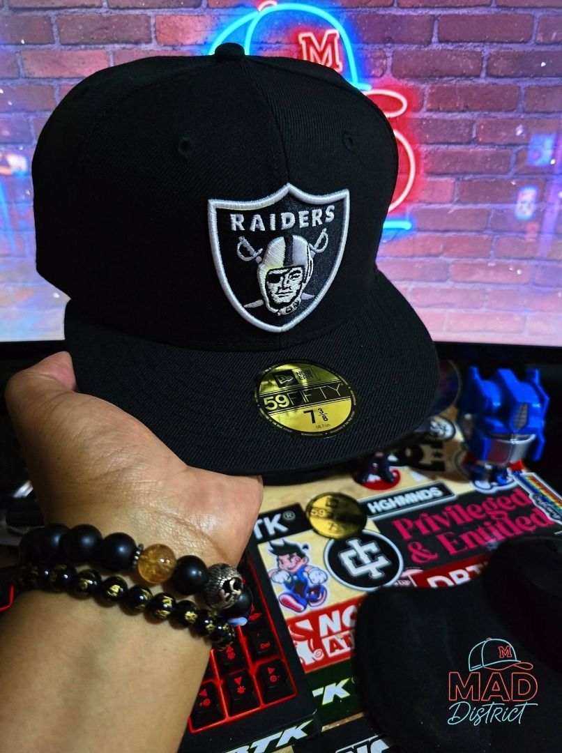 New Era 59FIFTY Raiders Fitted Cap Size 7 3/8 (Category: Caps & Hats) located in Pasig City. Submitted by markyboi888 (Listing ID 1460199154, Image 1). Description: - Brand New Era 59FIFTY Cap - Guaranteed Authentic - Color: Black - Team Logo: Classic Raiders logo on front - Size: 7 3/8 (58.7 cm) - 100% Wool - Style: Fitted Cap.
