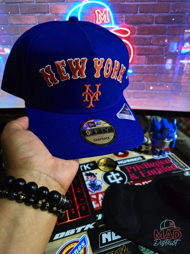 New Era 9FIFTY New York Mets Snapback Cap (Category: Caps & Hats) located in Pasig City. Submitted by markyboi888 (Listing ID 1460190794, Image 1). Description: - Royal blue New York Mets snapback hat - New Era 9FIFTY model - Features classic 'New York' embroidery and Mets logo - Adjustable snapback closure for a custom fit - Ideal for any fan of the New York Mets.