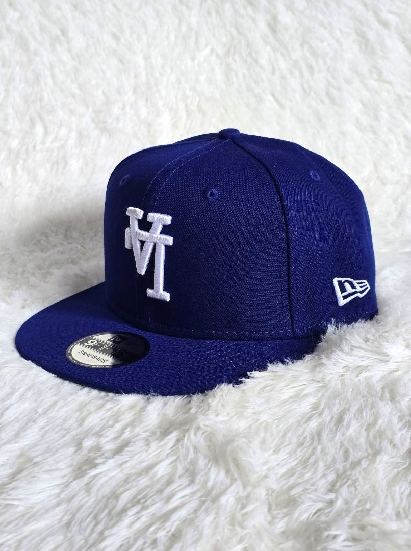 New Era LA Dodgers "Inverted Logo" (Category: Caps & Hats) located in Pasig City. Submitted by markyboi888 (Listing ID 1460192676, Image 2). Description: - Royal blue New Era cap - Features white LA Dodgers logo - Snapback style, one size fits most - Classic green underbrim - Ideal for any Dodgers fan.