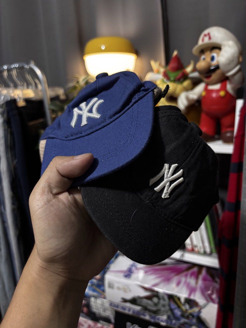 New York Dog Caps (2 pcs) (Category: Caps & Hats) located in Caloocan City. Submitted by bonsatocha43876 (Listing ID 1460193068, Image 3). Description: - Set of 2 New York dog caps - Colors: 1 Blue, 1 Black - Features classic NY logo - Condition: Very good - Price: P600 for both caps - Perfect for your furry friend!.