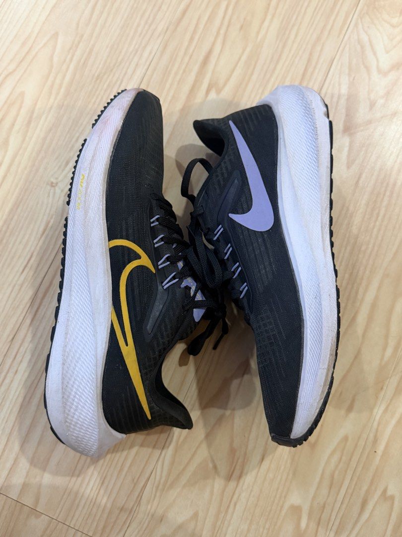 Nike Air Zoom Pegasus 39 (Category: Sneakers) located in Iligan City. Submitted by my.preloved29 (Listing ID 1460271657, Image 2). Description: Got this for 7,900+ | Used less than 5 times Nike Air Zoom Pegasus 39 🖤💜💛 ✨ Authentic Nike ✨ Style Code: DH4072-002 ✨ Black colorway with purple & yellow accents ✨ Lightweight and comfortable for everyday wear, walking, running, or casual fits ✨ Cushioned sole with Nike Air Zoom technology 📌 Bought fo