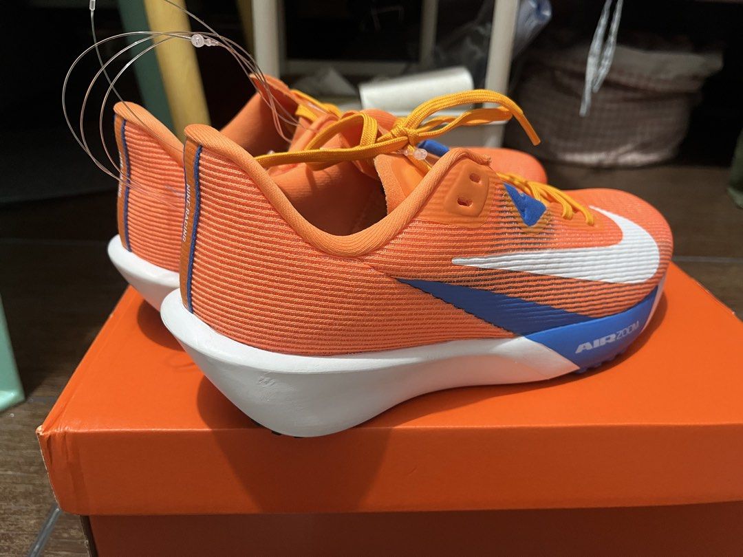 NIKE AIR ZOOM RIVAL FLY 4 (Category: Casual Shoes) located in Manila. Submitted by angelika_infante (Listing ID 1460206411, Image 3). Description: FOR SALE NIKE AIR ZOOM RIVAL FLY 4 (BRAND NEW) ❗ - bright manadarin/white mandarin - Unisex - US size 7.5 (M) and 9 (W) - Brand new and newly bought in sports central - Never been used - Selling for 2,200 pesos ❗ - rush need funds po 🥹 📍MANILA/CUBAO.