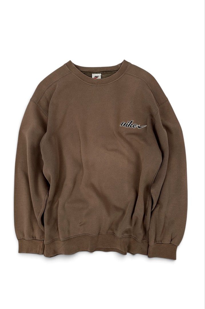 Nike Brown (Category: Coats, Jackets and Outerwear) located in Manila. Submitted by draftdrops (Listing ID 1460160052, Image 1). Description: Vintage,embroidered side design and excellent condition Width :22 Length :27 Size :large .