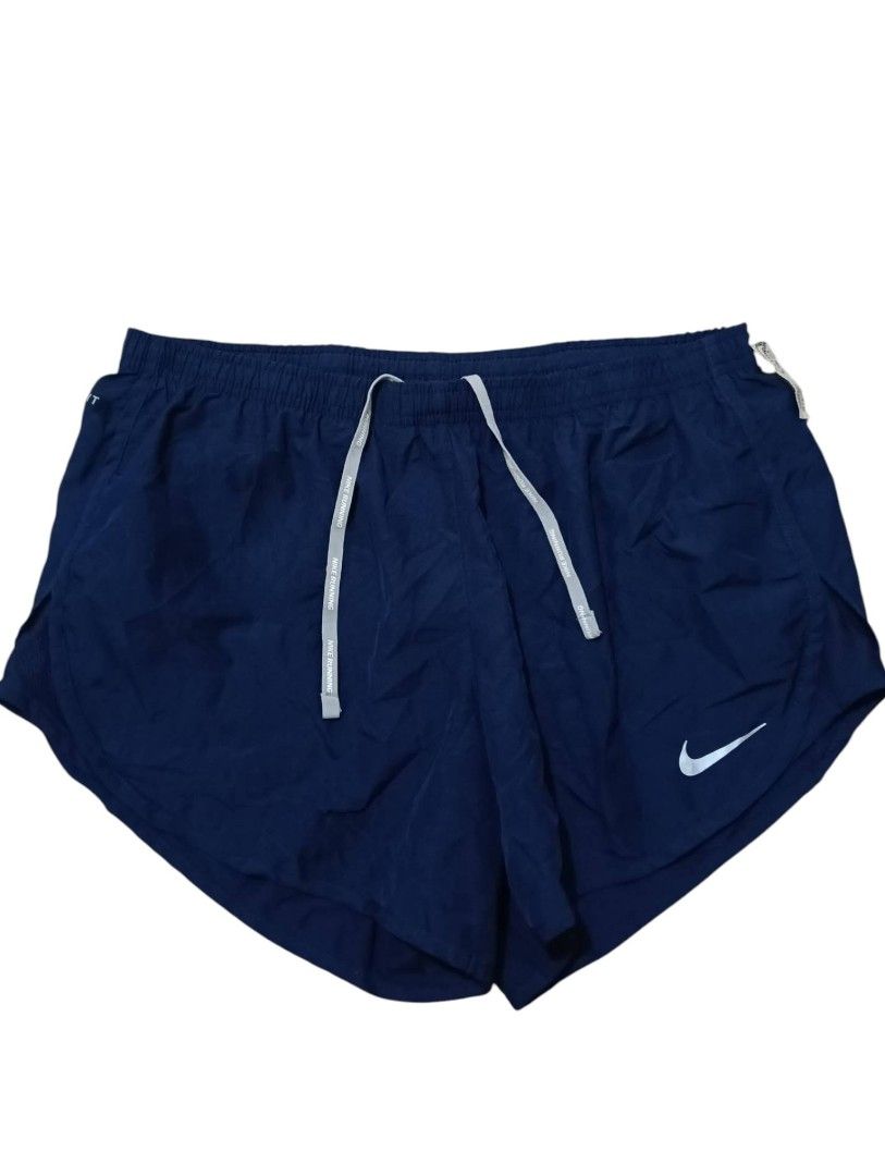 Nike Dry Fit Running Shorts (Category: Activewear) located in Manila. Submitted by rarefindsgallery (Listing ID 1460302105, Image 1). Description: Nike Running Shorts Size: Medium Color: Navy Blue Fits Medium to Large With drawstring Brief - lined.