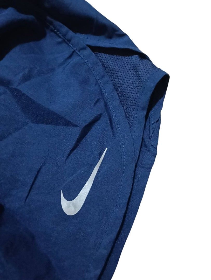 Nike Dry Fit Running Shorts (Category: Activewear) located in Manila. Submitted by rarefindsgallery (Listing ID 1460302105, Image 3). Description: Nike Running Shorts Size: Medium Color: Navy Blue Fits Medium to Large With drawstring Brief - lined.