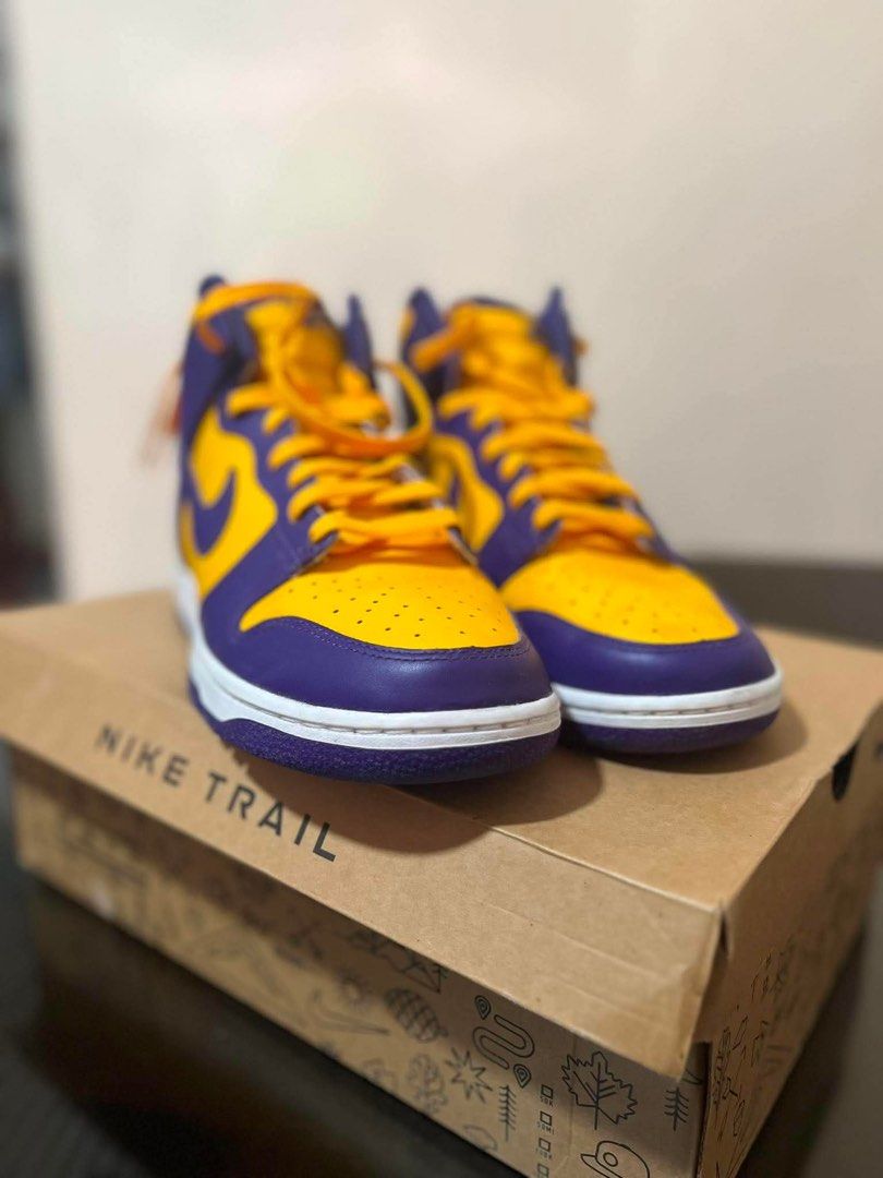 Nike Dunk High "Trail" Purple Yellow (Category: Sneakers) located in Pasig City. Submitted by alon02 (Listing ID 1460162573, Image 1). Description: - Nike Dunk High Trail Edition - Colorway: Purple and - Classic high-top silhouette - Ideal for collectors and sneaker enthusiasts.