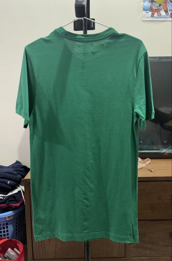 Nike Green Just Do It T-Shirt (Category: Tshirts & Polo Shirts ) located in Manila. Submitted by aj-thrifter (Listing ID 1460207858, Image 2). Description: - Classic green Nike t-shirt - Features iconic 'Just Do It' graphic - Comfortable cotton fabric - Short sleeves and crew neck design - Versatile for casual outfits or athletic activities - Easy to pair with jeans, shorts, or athletic bottoms - A wardrobe essential - 19-29.