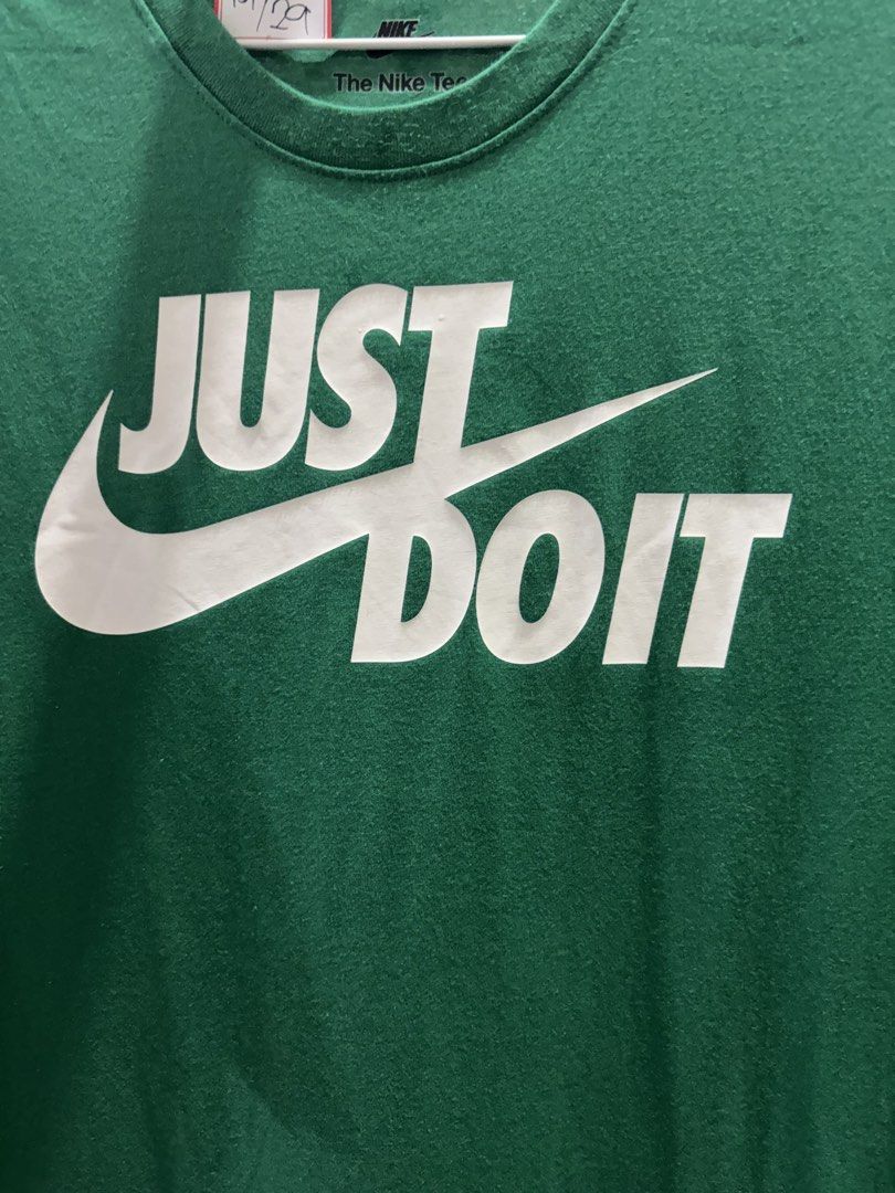 Nike Green Just Do It T-Shirt (Category: Tshirts & Polo Shirts ) located in Manila. Submitted by aj-thrifter (Listing ID 1460207858, Image 3). Description: - Classic green Nike t-shirt - Features iconic 'Just Do It' graphic - Comfortable cotton fabric - Short sleeves and crew neck design - Versatile for casual outfits or athletic activities - Easy to pair with jeans, shorts, or athletic bottoms - A wardrobe essential - 19-29.