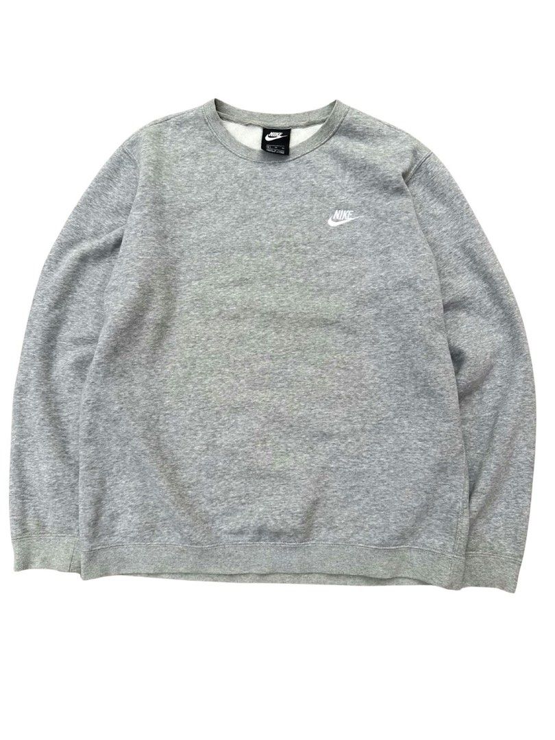Nike Grey Crewneck Sweatshirt XL (Category: Coats, Jackets and Outerwear) located in Padada. Submitted by jevanie1234 (Listing ID 1460267500, Image 1). Description: - Grey Nike crewneck sweatshirt - Small embroidered Nike logo on chest - Made in China - Material: 80% cotton, 20% polyester - Size: XL - Ideal for casual wear.