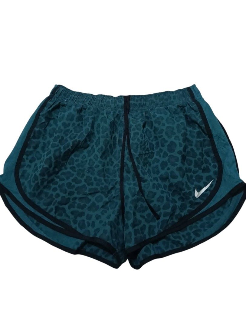 Nike Leopard Print Running Shorts (Category: Activewear) located in Manila. Submitted by rarefindsgallery (Listing ID 1460301953, Image 1). Description: Nike Leopard Print Running Shorts Size: Large Fits Large to XL Material : Quick dry fabric With drawstring Brief-lined.
