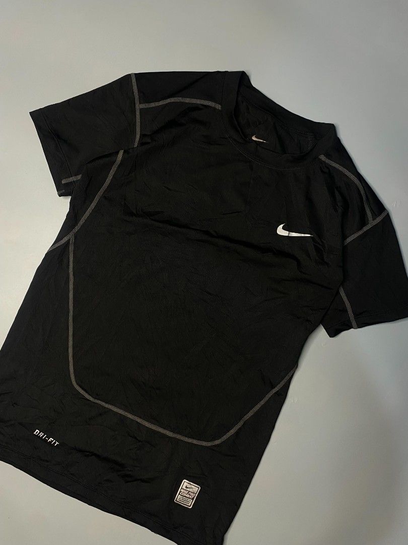 Nike Pro Combat Dri-FIT Compression T-Shirt (Category: Activewear) located in Ajuy. Submitted by quickcrystal-effaca (Listing ID 1460300866, Image 2). Description: - Black Nike Pro Combat T-shirt - Dri-FIT material for sweat-wicking - Compression fit for support - Ideal for workouts and sports.