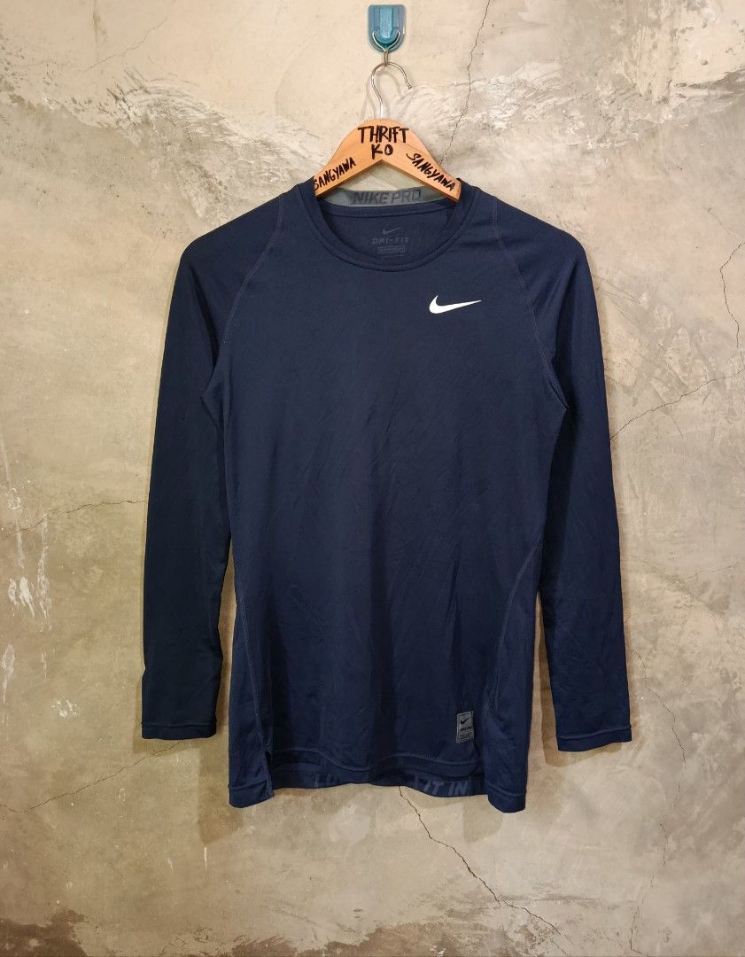 Nike Pro Dri-Fit Compression Long Sleeve Shirt (Category: Activewear) located in Kalamansig. Submitted by skone1996 (Listing ID 1460249492, Image 1). Description: - Navy blue Nike Pro Dri-Fit compression long sleeve shirt - Size: Medium (M) - 16 Width - 26 Length - 10/10 Color rate - No Issue - Ideal for workouts, sports, and athletic activities - Dri-Fit technology for breathability, keeping you cool and dry - Features the iconic Nike swoosh log