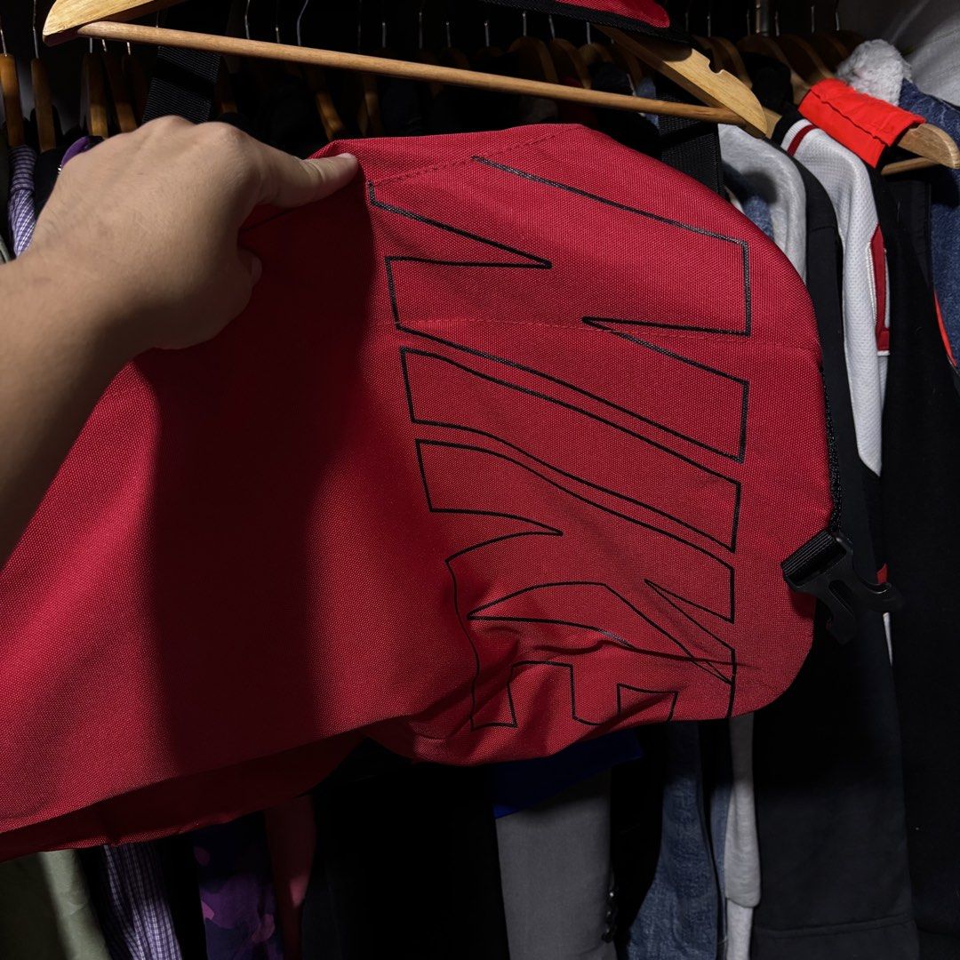 Nike Red Duffle Bag (Category: Sling Bags) located in Caloocan City. Submitted by bonsatocha43876 (Listing ID 1460193238, Image 2). Description: - Red Nike duffle bag - Dimensions: 13 inches width, 17 inches length - Condition: Very good - Price: 850 pesos only.