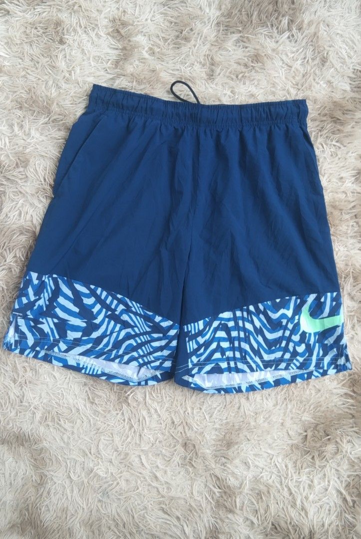 NIKE short (Category: Activewear) located in Iriga City. Submitted by flips_thrifting903 (Listing ID 1460118005, Image 1). Description: Brand: Nike(Draw String) Color: Blue,light blue,neon green waistline:32 to 33 length:18 Fabric:(Made in Vietnam)100 Polyester 2 pockets Complete tag Garterized/Stretchable XL on tag Open for meetups and shipping via J&T, Flash,JRS,LBC Iriga city Nabua Baao Pili Naga City Magarao Calabanga Tinambac Mop: cash or gc