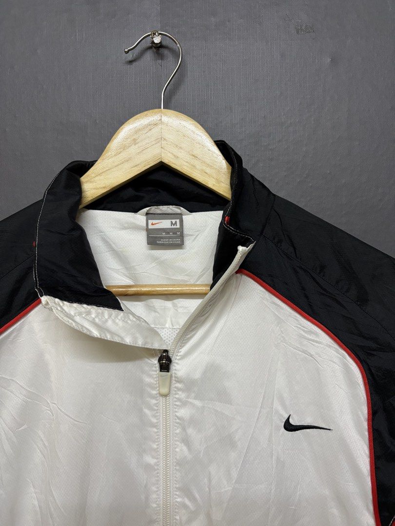 Nike Windbreaker (Category: Coats, Jackets and Outerwear) located in Cavite. Submitted by staythrifted.23 (Listing ID 1460221586, Image 2). Description: Size : Medium on 🏷️ Dimes : Lenght 27 Width 21 Sleeve Lenght 25.5 Condition : Like new Color rate : 9.8/10 Issue : Minimal scratch Loc. Cavite We ship nationwide Payment first .
