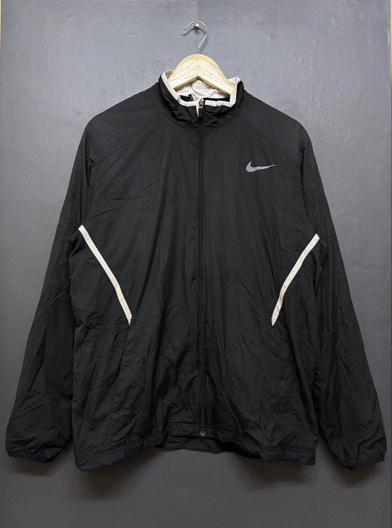 Nike Woven Jacket (Category: Coats, Jackets and Outerwear) located in Cavite. Submitted by staythrifted.23 (Listing ID 1460223535, Image 1). Description: Size : X Large on 🏷️ Large best fit Dimes : Lenght 27 Width 22.5 Sleeve lenght 25.5 Condition : Like new Color rate : 9.8/10 Issue : None Loc. Cavite We ship nationwide Payment first .