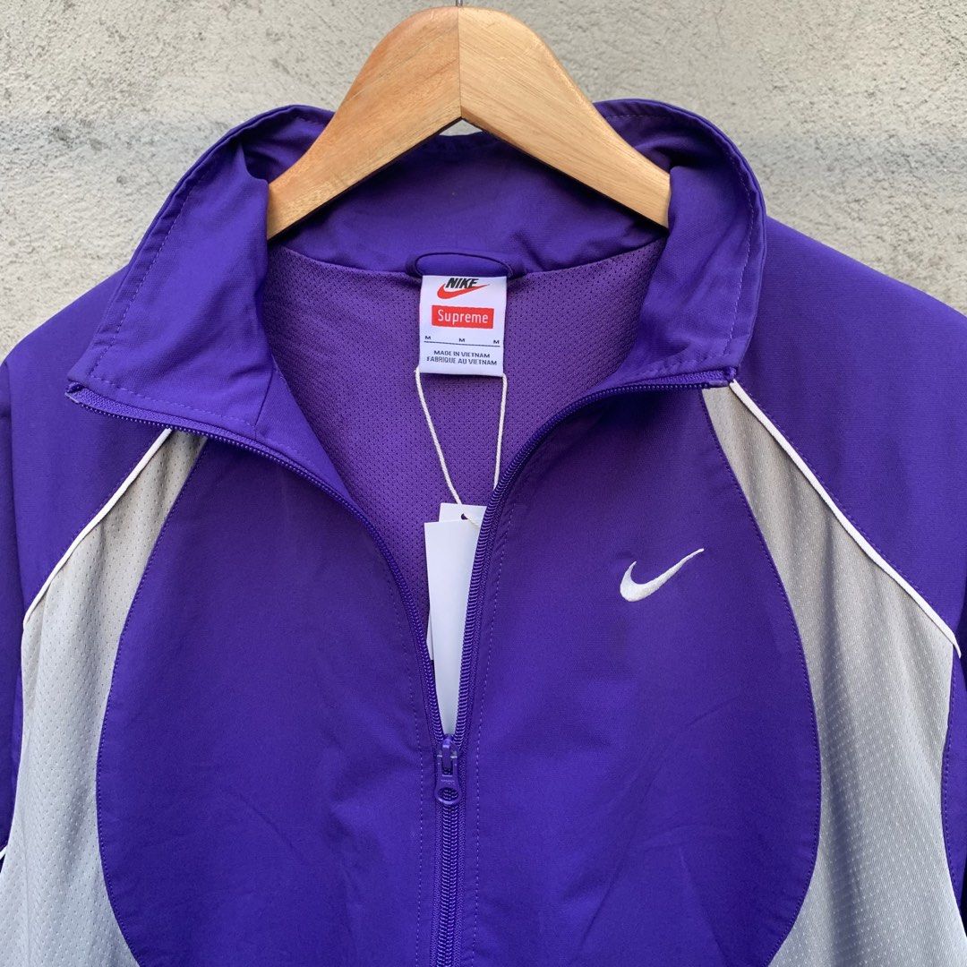 Nike x Supreme Track Jacket Purple (Category: Coats, Jackets and Outerwear) located in Kalibo. Submitted by gneiss2002 (Listing ID 1460215836, Image 3). Description: - Nike/Supreme track jacket - Features a Supreme/Nike tag - Size: Medium (M) - Condition: Brand new, still has tags on - Made in Vietnam.