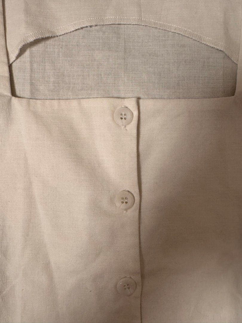 Nikocia Laura Square Neck Button-Up Linen Top (Category: Blouses) located in Bacoor. Submitted by ailujanitsirc (Listing ID 1460260615, Image 3). Description: ✧･ﾟ: *✧･ﾟ:* - White linen square neck top - Complete buttons - Never used - Fits S - Bought for ₱680 - RFS: Decluttering MOP: Gcash, BPI, and Maya Delivery: Lalamove, Grab Express, Gogo express (SF shouldered by the buyer) ✧･ﾟ: *✧･ﾟ:*.