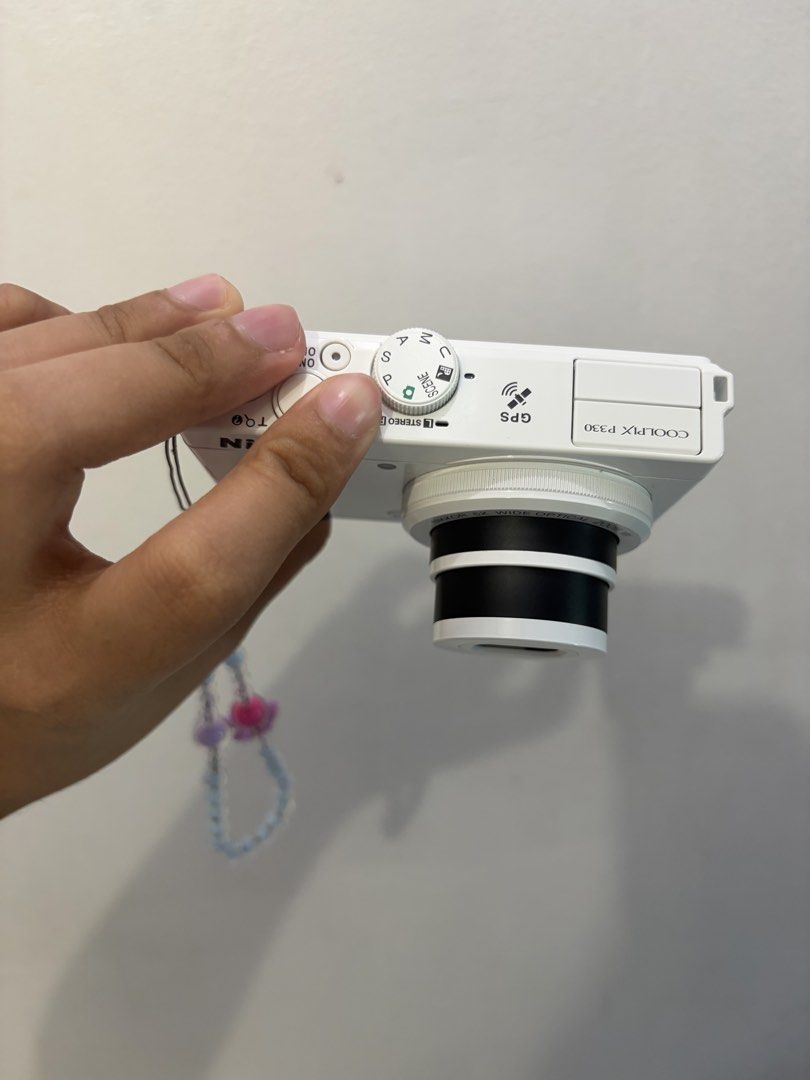 NIKON P330 (PERSONAL USED) (Category: Cameras) located in Manila. Submitted by mystic.drovich (Listing ID 1460290413, Image 3). Description: Nikon COOLPIX P330 – White 📸 Personal camera. Pre-loved and fully functional. In good condition with slight vignette and 2 small bubble-like spots visible on the screen. Aside from these, no other known issues and everything works properly. Specs: • 12.2MP CMOS Sensor • f/1.8 NIKKOR Lens • 5x Optical Zoom (