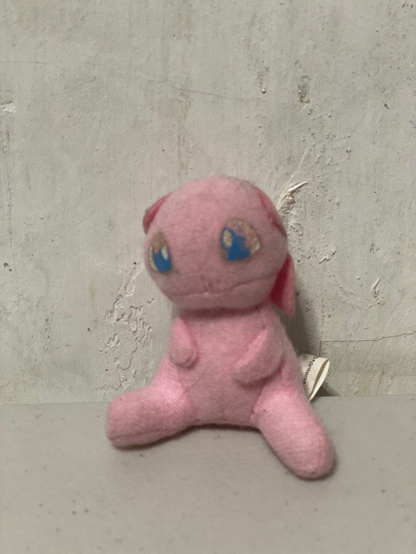 Nintendo Pokemon Mew Plush Toy (Category: Plushies & Soft Toys) located in Manila. Submitted by kuya_moto (Listing ID 1460280090, Image 1). Description: - Adorable pink Mew plush toy - Officially from Nintendo and Pokemon - Perfect for collectors and fans - Small size, ideal for display - Brand new with tag still attached - A fun and charming collectible.