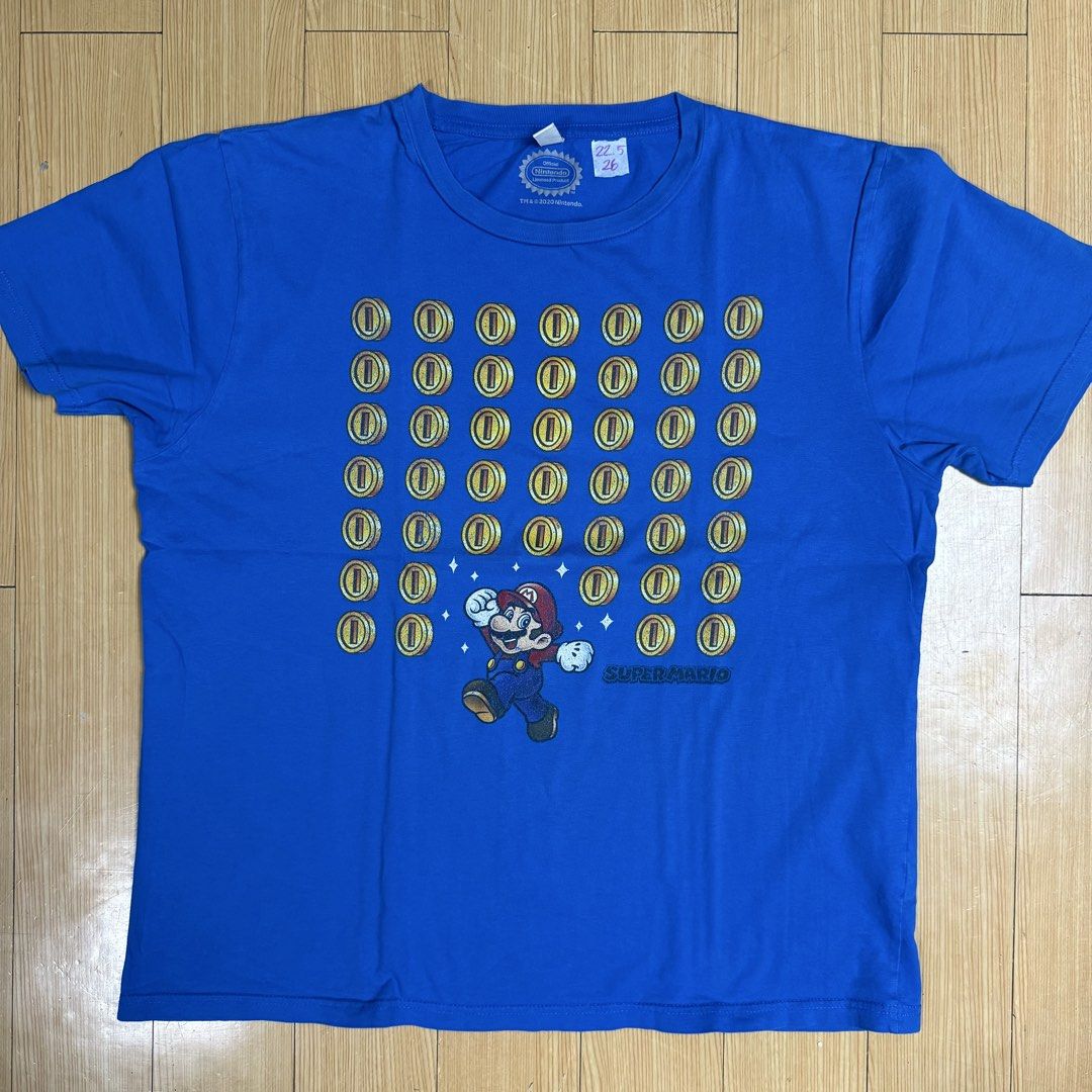 Nintendo Super Mario T-Shirts (Bundle) (Category: Tshirts & Polo Shirts ) located in Rizal. Submitted by shirtguy78 (Listing ID 1460291084, Image 3). Description: - Bundle of three Nintendo Super Mario t-shirts. - Black shirt features a Bullet Bill graphic. - White shirt showcases various characters: Mario, Luigi, Bowser, and Yoshi. - Blue shirt has a design of Mario and gold coins. - Ideal gift for any Super Mario enthusiast. - can be sold separ