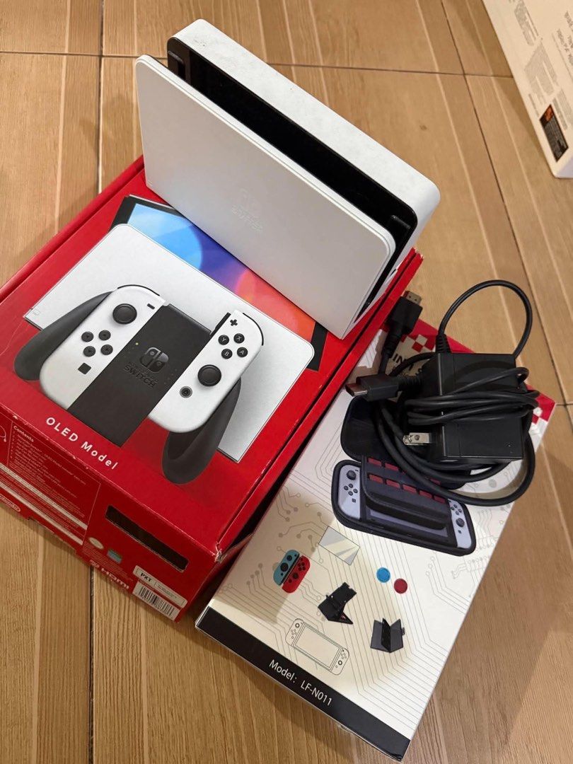 NINTENDO SWITCH OLED MODEL (Category: Nintendo) located in Navotas City. Submitted by johnpaull85919 (Listing ID 1460131849, Image 3). Description: 🎮 NINTENDO SWITCH OLED FULL BUNDLE FOR SALE! 🎮 🕹️ 8 MONTHS OLD Everything shown in the photos is INCLUDED! Perfect for anyone looking for a ready-to-play Nintendo Switch OLED setup. 🔥 📦 INCLUDED: ✅ Nintendo Switch OLED Console ✅ Nintendo Switch Joy-Con Controllers ✅ Nintendo Switch Dock ✅ Origina