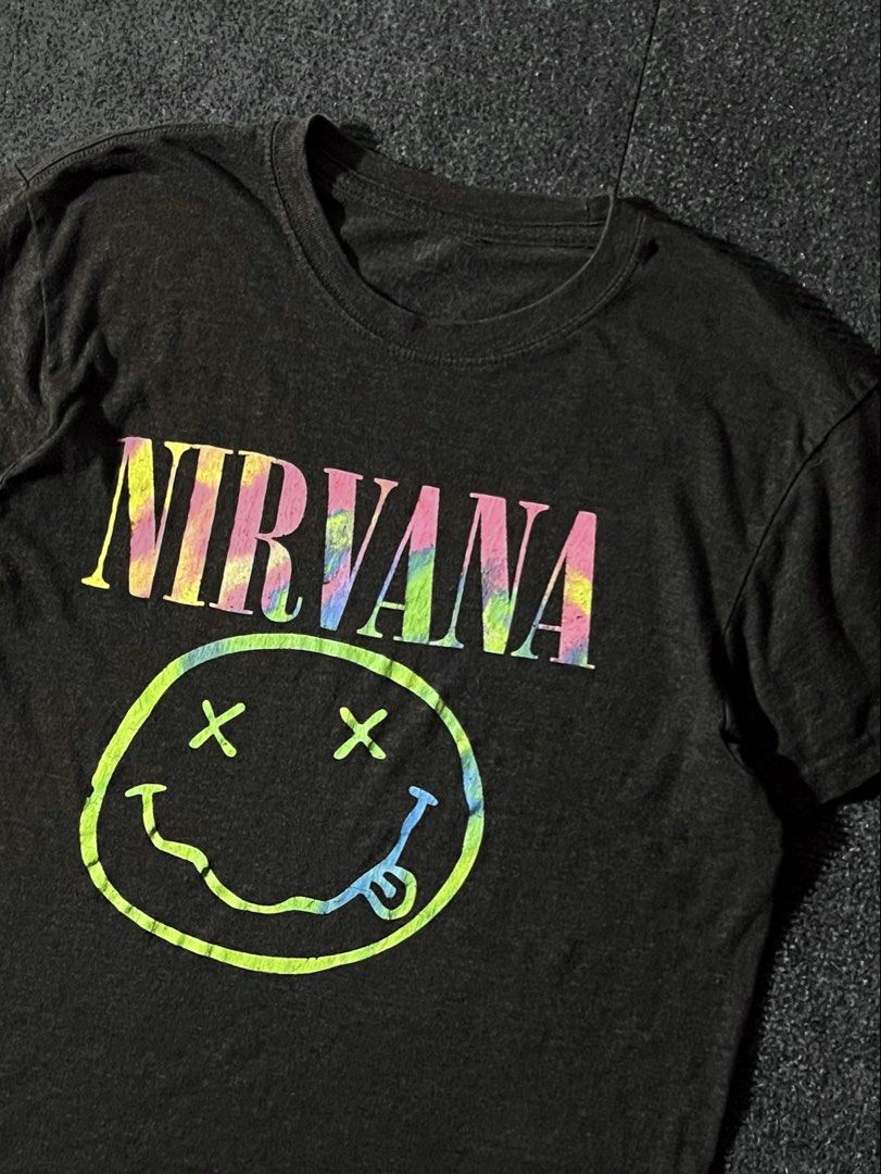 Nirvana Smiley Face Tie-Dye T-Shirt (Category: Tshirts & Polo Shirts ) located in Los Banos. Submitted by reworn.clo2026 (Listing ID 1460116449, Image 2). Description: Size: Small * Width: 19 * Length: 26 * Used condition.