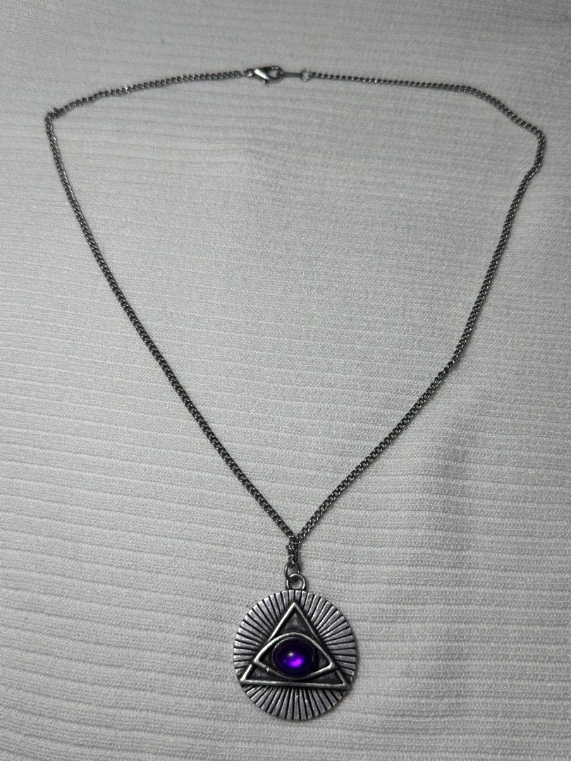 Occult eye necklace (Category: Necklaces) located in Ligao. Submitted by veetrinkets (Listing ID 1460264155, Image 2). Description: 18 inches Lobster clasp Stainless steel Silver tone.