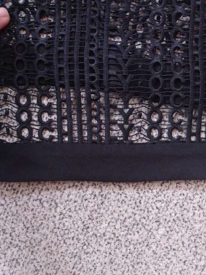 OCHIRLY Black Mesh Crop Top (Category: Blouses) located in Cabadbaran. Submitted by ztsfinds (Listing ID 1460129566, Image 3). Description: -Worn over a camisole, bralette or tank top. -a black hollow-cut mesh crop top. -This is curated ukay clothes, already washed. -Size: Small (160/84A) -Length: 47 cm -Width laid flat: 45 cm.
