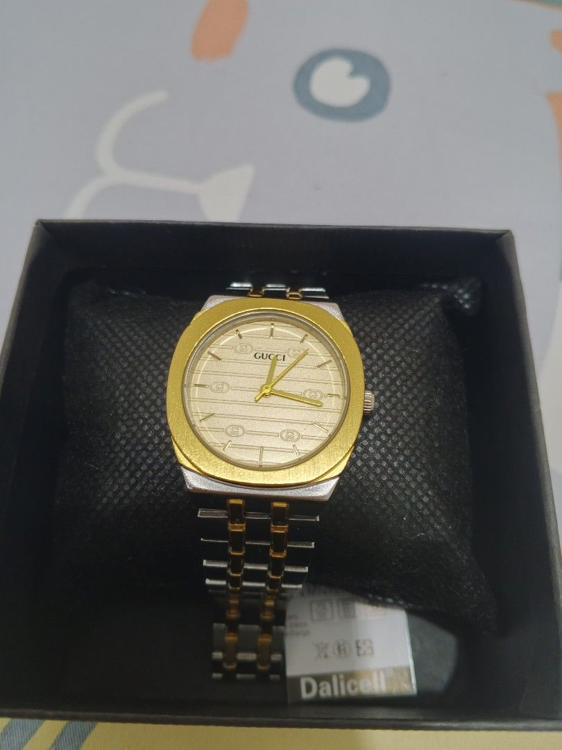 OEM watch (Category: Luxury Watches) located in Manila. Submitted by ghie_0116 (Listing ID 1460247820, Image 2). Description: - Set of 3 premium watches - Casio watch with blue dial and date function - Rolex watch featuring a striking green dial and diamond markers - Elegant gold and silver tone Gucci watch - All watches come with their original boxes - Ideal for watch collectors or as a thoughtful gift.