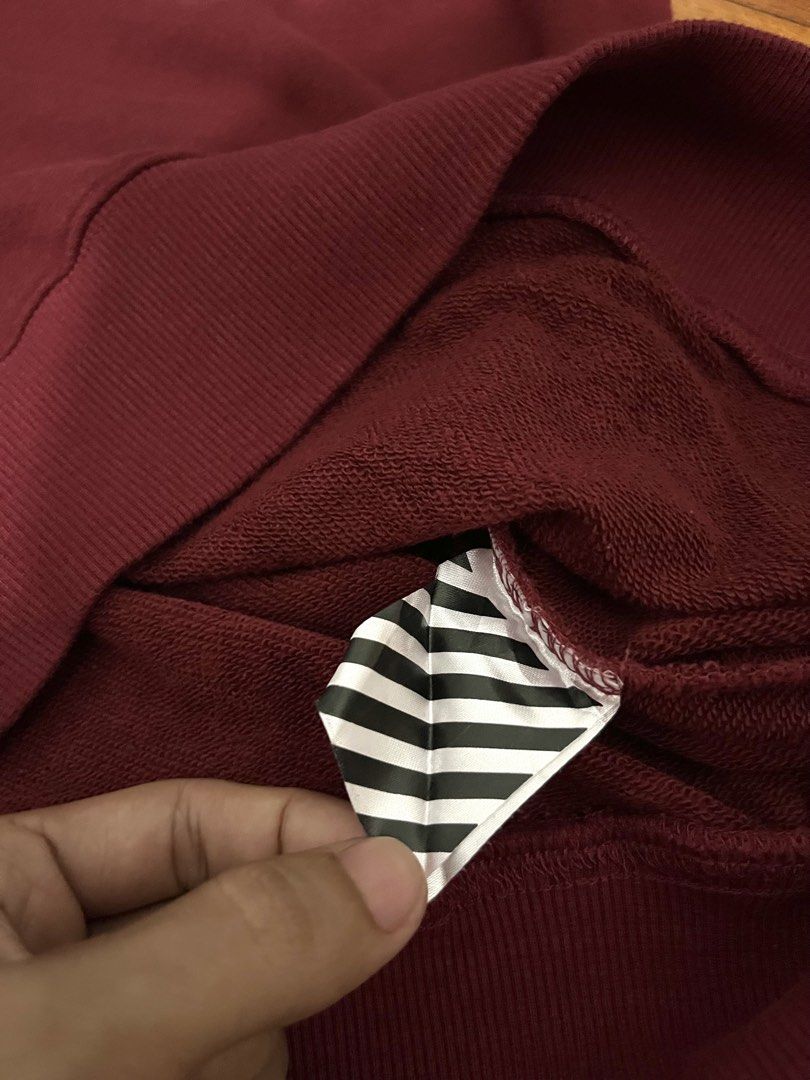 OFF-WHITE “maroon” Sweatshirt (Category: Coats, Jackets and Outerwear) located in Manila. Submitted by oloip.thrift (Listing ID 1460131908, Image 3). Description: Excellent Condition Size: M Dimes: 21/26 No issue.