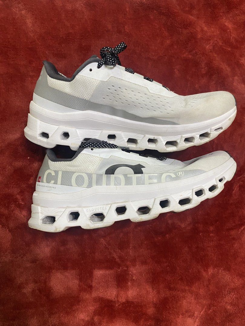 On Cloudmonster Running Shoes White (Category: Casual Shoes) located in Alburquerque. Submitted by zanegavynn43872 (Listing ID 1460241968, Image 3). Description: - On Cloudmonster running shoes in white. - Signature CloudTec cushioning for ultimate comfort. - Perfect for road running. - Black and white speckled laces. - Minor dirt on soles from normal use. - Plenty of mileage remaining..