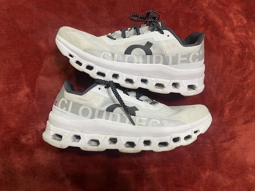 On Cloudmonster Running Shoes White (Category: Casual Shoes) located in Alburquerque. Submitted by zanegavynn43872 (Listing ID 1460241968, Image 2). Description: - On Cloudmonster running shoes in white. - Signature CloudTec cushioning for ultimate comfort. - Perfect for road running. - Black and white speckled laces. - Minor dirt on soles from normal use. - Plenty of mileage remaining..
