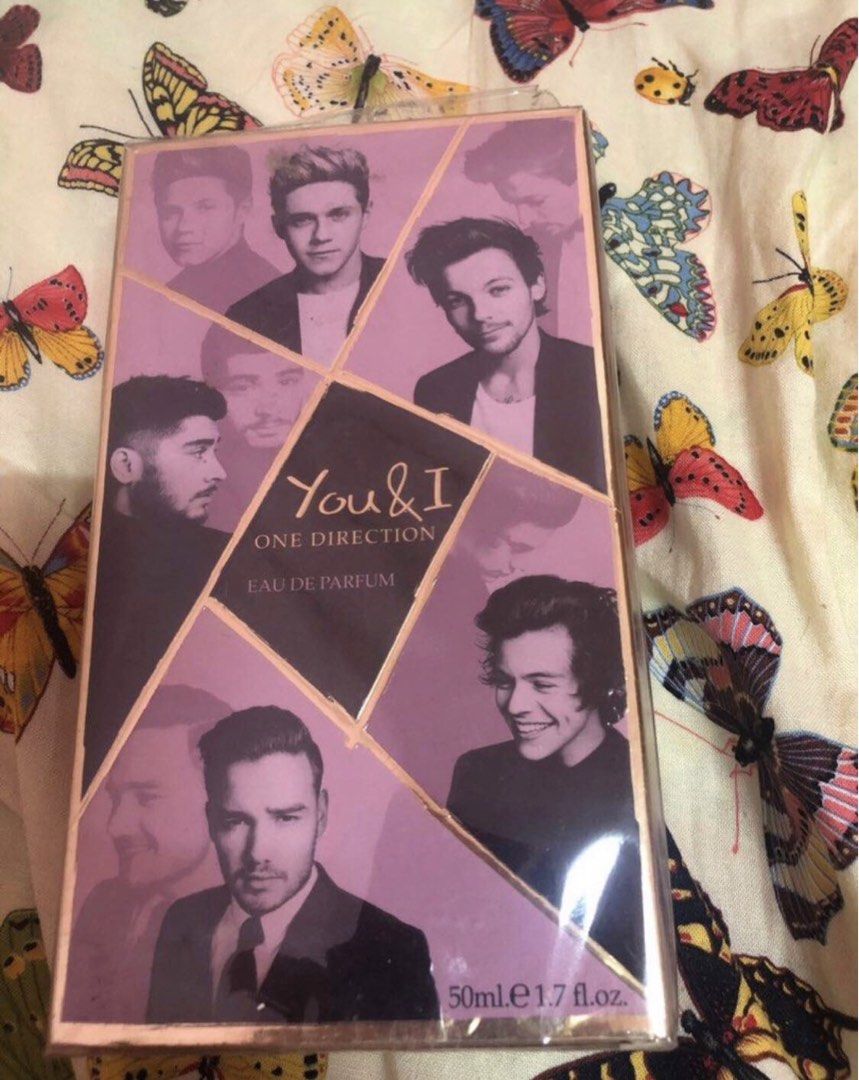 One Direction You & I Eau de Parfum 50ml with Ring (Category: Fragrance & Deodorants) located in Bacoor. Submitted by mysticturtle_1614dc (Listing ID 1460243684, Image 1). Description: - One Direction You & I Eau de Parfum (50ml) - Includes a cute, gold ring with pink and sparkly details - Original box features photos of the One Direction boys - Gem-shaped perfume bottle - Perfect gift for any Directioner!.