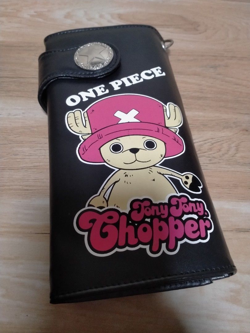 ONE PIECE TONY TONY CHOPPER LONG WALLET (Category: Wallets & Card Holders) located in Cabuyao City. Submitted by Bike_Clothing10 (Listing ID 1460149776, Image 2). Description: READ FIRST... FOR SALE: ONE PIECE TONY TONY CHOPPER LONG WALLET Excellent Condition With Chain NOTE: Slight markings lang sa back part, naipit kasi ng matagal kasama ng ibang wallet. PRICE: 550 Fixed + SF PICK UP OR SHIPPING ONLY LOCATION: Cabuyao Laguna -NO COD/COP- MOP: G
