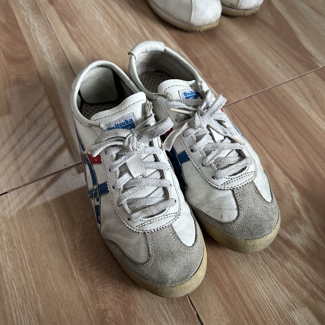 ONITSUKA TIGER (Category: Sneakers) located in Bulacan. Submitted by itemsbyjj (Listing ID 1460198538, Image 3). Description: Original onitsuka tiger Issues: creases, cracks, faded logo and design.