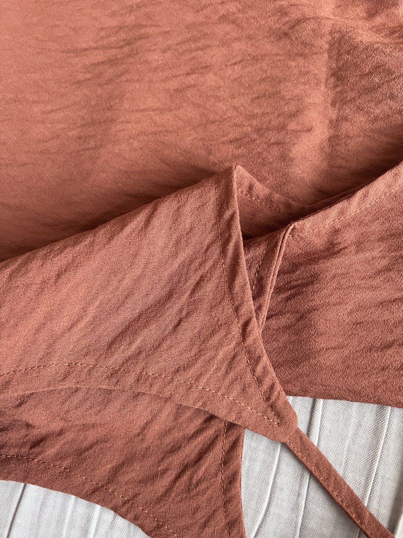 orange brown linen like top (Category: Sleeveless) located in Dasmarinas. Submitted by pinex (Listing ID 1460160082, Image 2). Description: - fabric is cotton/linen like - measurements laid flat: straps to hem: 21.5 in pit to pit: 17 in.