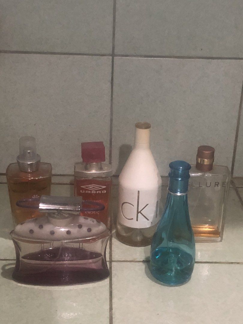 Original authentic perfumes for decluttering take all at P1,500 (Category: Fragrance & Deodorants) located in Malabon City. Submitted by bravehorse.ad6fd6 (Listing ID 1460186919, Image 1). Description: 1) Fleurs de Tahiti EDT 100ml 95% (with improvised cap) 2) Umbro Girl Sport Exotic EDT 50ml 90% (with slight cap defects) 3) Calvin Klein In2U EDT 100ml 40% 4) Chanel Allure EDP 100ml 5% 5) Sex In the City Lust EDP 100ml 50% 6) Davidoff Cool Water 