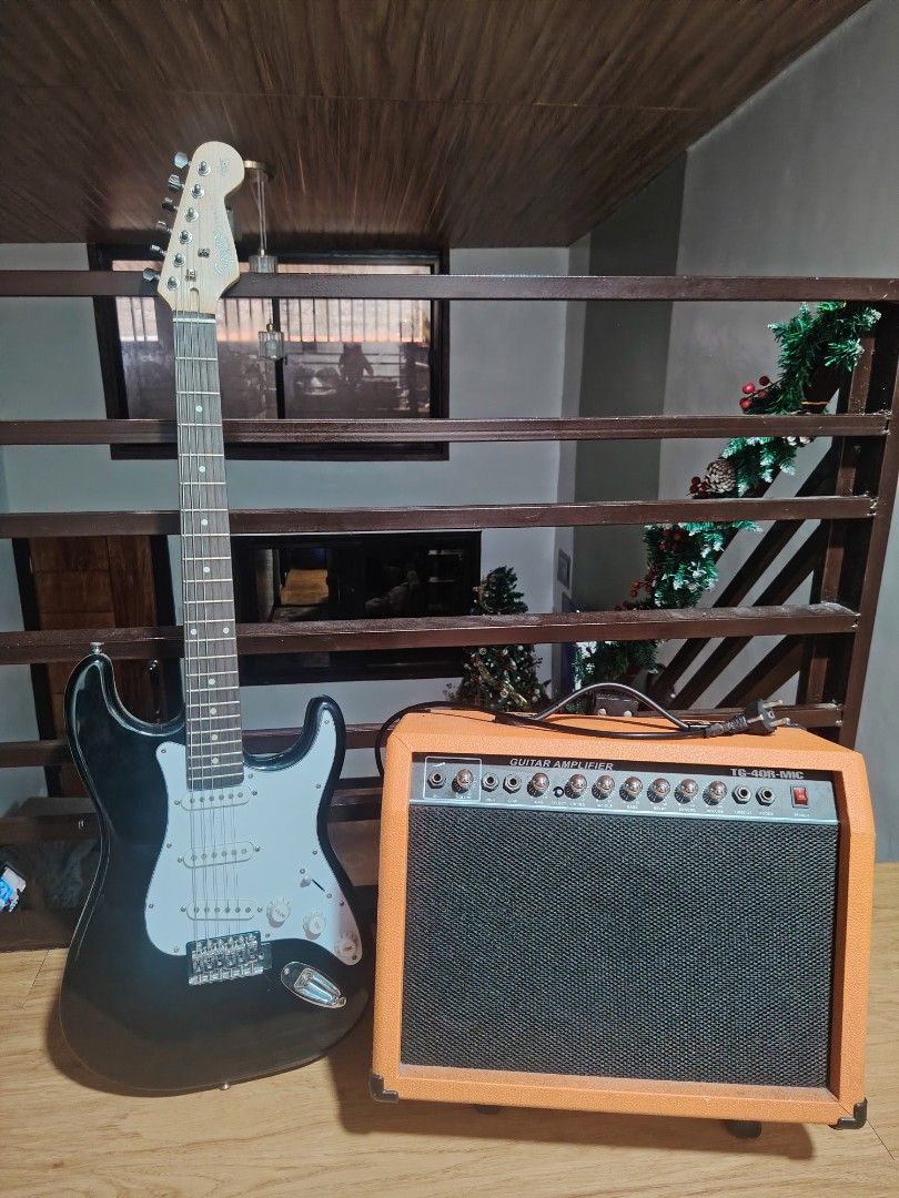 ORIGINAL ELECTRIC GUITAR FENDER W/ AMPLIFIER (Category: Musical Instruments) located in Manila. Submitted by mauve_meraki (Listing ID 1460265032, Image 1). Description: ORIGINAL FENDER ELECTRIC GUITAR + AMPLIFIER 💯 100% ORIGINAL FENDER** ELECTRIC GUITAR 🏷️ Bought at ₱15,000 📍 Bought at S**M 🔊 TG 40W Guitar Amplifier 🎛️ 3 Inputs 🛒 Bought from Shop** for ₱2,800 💰 Total original purchase value: ₱17,800.
