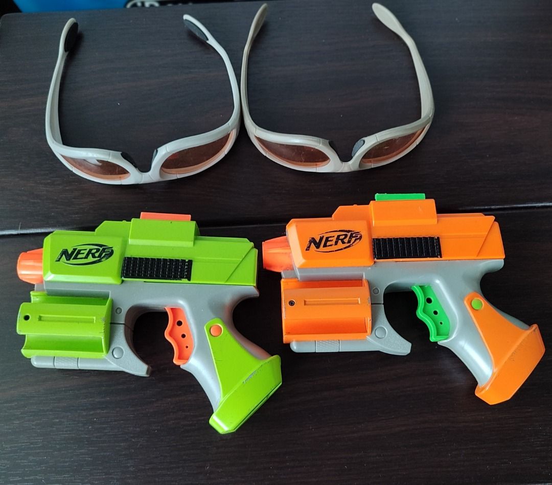 Original Nerf Dart Tag FuryFire COMPLETE 2 Player Set (Category: Action & Battle Toys) located in Mandaluyong City. Submitted by thethrifthaul (Listing ID 1460167052, Image 2). Description: - Complete Nerf battle set! - Includes 2 Nerf furyfire blasters--both working - thicker ABS plastic shells -2 Nerf vision gear protective eyewear - 2 Nerf Dart Tag Scoring Vests - All items are genuine Nerf brand - Perfect for exciting Nerf battles!.