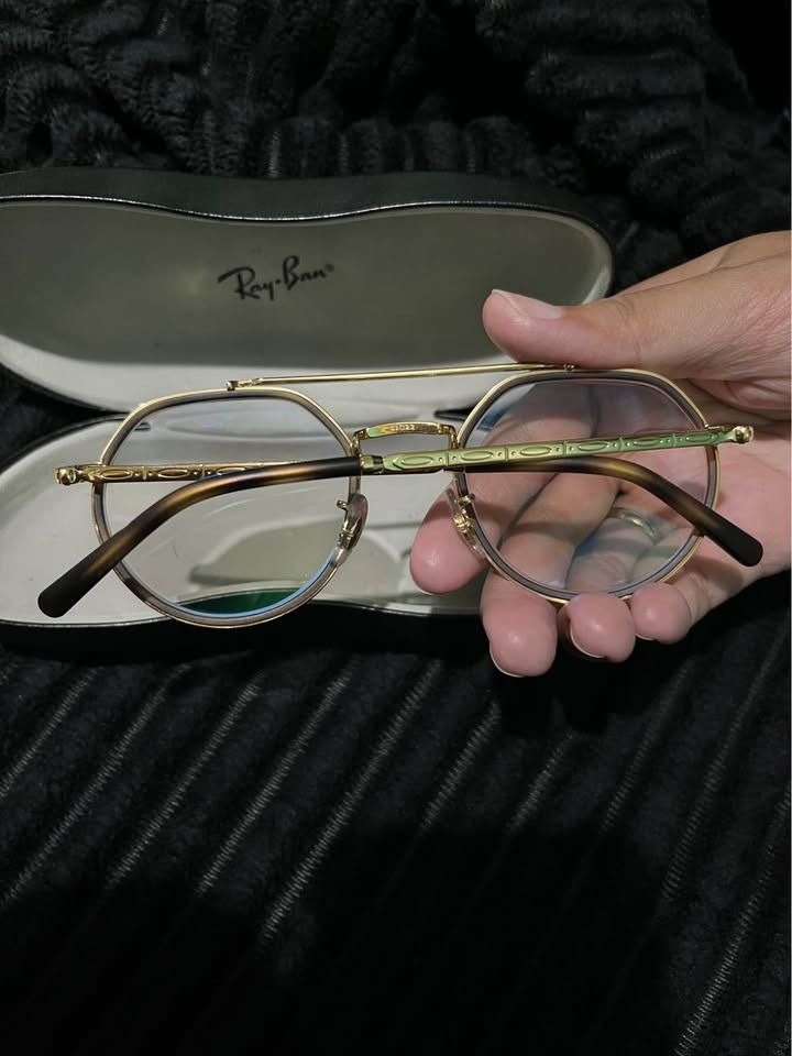 ORIGINAL UNISEX RAYBAN EYEGLASSES (Category: Sunglasses & Eyewear) located in Manila. Submitted by altheamrcl96368 (Listing ID 1460108905, Image 2). Description: For Sale: Original Rayban Eyeglasses Model: RB3765V Size: 51-22mm Used for like 3 times only Good as new Bought for 15k, can sell for 12k Price is negotiable for sure buyers Have graded lens, but you can change it to your preferred optical shops. Right lens: 400 Left lens: 250.