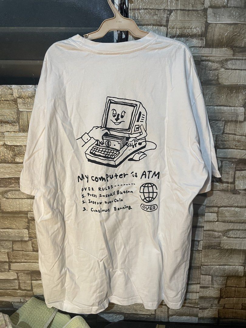 OVER Protocol White Graphic T-Shirt (Category: Tshirts & Polo Shirts ) located in Cebu City. Submitted by grand_kian (Listing ID 1460236477, Image 2). Description: - Brand new OVER Protocol graphic tee - Features 'My Computer is ATM' graphic on the back - Original tags still attached - Comfortable, oversized fit - Ideal for casual wear.