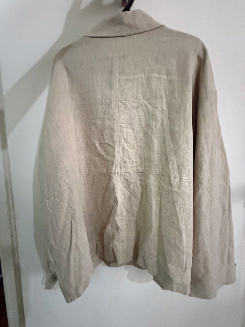 Oversized Linen Jacket Beige (Category: Coats, Jackets and Outerwear) located in Manila. Submitted by muggles_closet (Listing ID 1460139134, Image 3). Description: W25in L 26in Armhole 10in Brand : South Korean minimalist fashion label GED (게드 beige, relaxed-fit linen button-up shirt jacket featuring multiple front utility pockets and dark brown buttons..
