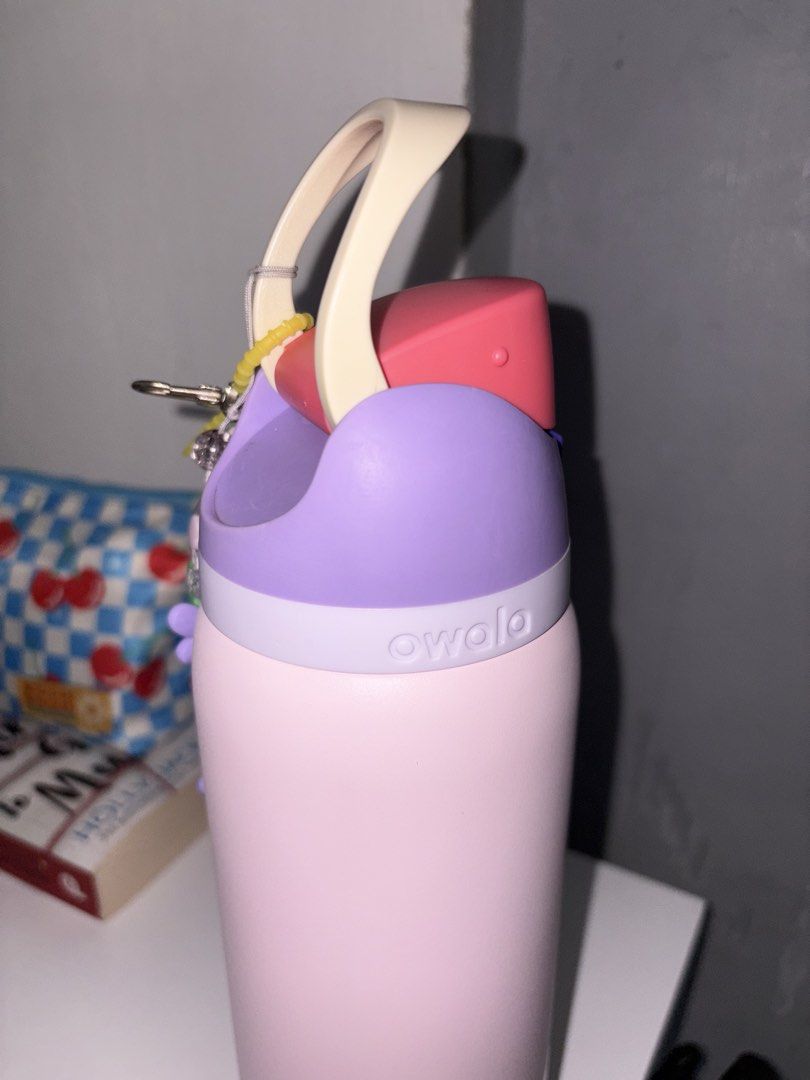 Owala Purple Blossom Bunny 32oz (Category: Water Bottles & Tumblers) located in Cavite. Submitted by madeleineguillermo (Listing ID 1460135053, Image 3). Description: - Cute pink and purple Owala water bottle - Easy to carry with a top handle - Ideal for staying hydrated and showing off your love for cute characters pwede ko po i-remove yung stickers if prefer na clean lang yung tumbler .